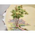 VINTAGE 1950`s AYNSLEY BONE CHINA TWIN HANDLED CAKE PLATTER, BUTTERY YELLOW WITH A LANDSCAPE MOTIF