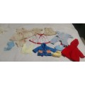 A Collection Of Vintage Dolls Clothes.