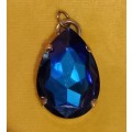 Vintage Gold Tone Pendant with Stunning Blue Faceted Glass Stone