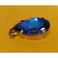 Vintage Gold Tone Pendant with Stunning Blue Faceted Glass Stone