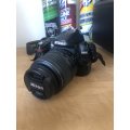 NIKON D3000 WITH 18-55MM ZOOM LENS IN VERY GOOD CONDITION
