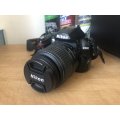 NIKON D3000 WITH 18-55MM ZOOM LENS IN VERY GOOD CONDITION