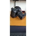 Canon 7D Body with Canon EFS 18 - 200mm Lens