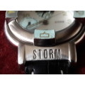 STORM WATCH WITH GENUINE CALFSKIN LEATHER STRAP IN EXCELLENT CONDITION