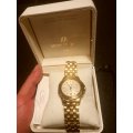 A STYLISH GOLD PLATED MICHEL HERBELIN "SAFARI" GENTS WRIST WATCH IN BOX. EXCELLENT CONDITION