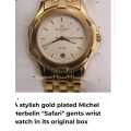 A STYLISH GOLD PLATED MICHEL HERBELIN "SAFARI" GENTS WRIST WATCH IN BOX. EXCELLENT CONDITION