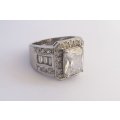 STUNNER !!! A SOLID STERLING SILVER RING WITH LOTS OF FACETED CLEAR STONES - MADE FOR AMERICAN SWISS