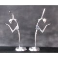 TWO TALL CHROME LOOK "DANCING" STICK FIGURES