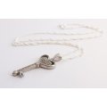 A STERLING SILVER NECKLACE PLUS A STERLING SILVER KEY PENDANT ...SET WITH STONES