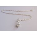 A STERLING SILVER NECKLACE PLUS A STERLING SILVER PENDANT SET WITH A FACETED STONE