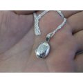 LAST ONE !!!! A STERLING SILVER ENGRAVED LOCKET PENDANT WITH A 45 CM STERLING SILVER NECKLACE ...
