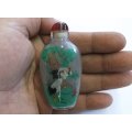 A FANTASTIC ORIENTAL GLASS SNUFF BOTTLE WITH WILD BIRD , BAMBOO AND FORREST DECORATION ...SWEET !!