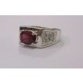 Brilliant Quality solid Sterling Silver ring with 12 clear faceted stones and one red faceted stone
