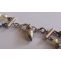 WOW !! AN ELEGANT DOUBLE STRAND GENUINE PEARL BRACELET WITH SOLID STERLING SILVER DESIGNER CLASP !!
