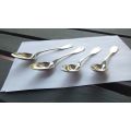 4 MEDIUM SIZED SPOONS BY CHRISTOFLE OF FRANCE