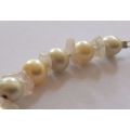 A GENUINE AKOYA PEARL , ROSE QUARTZ AND OTHER FRESHWATER PEARL BRACELET WITH STERLING SILVER CLASP