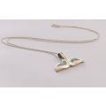 A VERY SOLID AND CHARMING STERLING SILVER "WHALE TAIL" PENDANT PLUS A 45CM STERLING SILVER NECKLACE