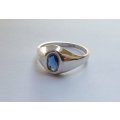 COOL FIND !! A GREAT LOOKING SOLID STERLING SILVER RING SET WITH A FACETED BLUE STONE !! WOW !!