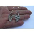 A VERY STYLISH INTRICATELY DETAILED PAIR OF SOLID STERLING SILVER EARRINGS WITH CURVES MOTIF !!