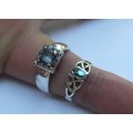 TWO SOLID STERLING SILVER RINGS ,ONE WITH FACETED BLUE STONE , ONE WITH AN ABALONE LOOK INSET !! WOW