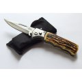 GREAT LOOK !! A BRAND NEW SHARP FLICK KNIFE WITH FAUX ANTLER HANDLE !! FREE COMBINING !!