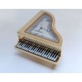 A NOTEWORTHY FIND !! PERFECT GIFT !! A VERY HEAVY FOR SIZE METAL CLOCK IN PIANO FORM WITH BOX !! WOW