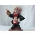 A HIGHLY DETAILED EYE CATCHING VINTAGE SOLID RESIN COMPOSITE FIGURE OF AN ORCHESTRA CONDUCTOR !! FUN
