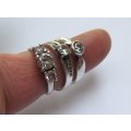 THREE ABSOLUTELY GORGEOUS SOLID STERLING SILVER RINGS SET WITH CUBIC ZIRCONIAS !! BID FOR THE LOT !!