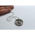 A STYLISH STERLING SILVER "WHEEL" PENDANT SET WITH VARIOUS STONES PLUS A STERLING SILVER NECKLACE !!