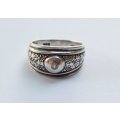 A GREAT QUALITY SOLID STERLING SILVER RING SET WITH FACETED STONES - STAMPED AND TESTED