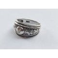 A GREAT QUALITY SOLID STERLING SILVER RING SET WITH FACETED STONES - STAMPED AND TESTED