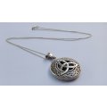 A "MAGICAL" STERLING SILVER CELTIC MOTIF PENDANT WITH A COMPLIMENTARY 50CM STERLING SILVER NECKLACE