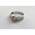 A LOVELY SOLID STERLING SILVER ENGAGEMENT TYPE RING SET WITH FACETED CZ STONES !! FREE COMBINING !!