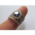 AN INCREDIBLE SOLID STERLING SILVER HALO RING SET WITH LOTS OF FACETED STONES !! MUST HAVE QUALITY !