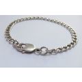 A STRONG VINTAGE  SOLID STERLING SILVER STARTER CHARM BRACELET WITH OVERSIZED CLASP !! WOW !!