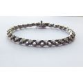 A CLASSY VINTAGE LOOK SOLID STERLING SILVER BRACELET WITH SAFETY CLASP AND FACETED STONES !! LOOK !!