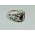 KYK !! A LOVELY SOLID STERLING SILVER RING SET WITH A SINGLE FACETED PURPLE STONE !! FULLY TESTED !!