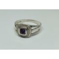 KYK !! A LOVELY SOLID STERLING SILVER RING SET WITH A SINGLE FACETED PURPLE STONE !! FULLY TESTED !!