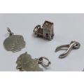 A COOL LOT OF 9 ASSORTED VINTAGE STERLING SILVER CHARMS INCLUDING A DESIGNER PIECE BY WHITE ICE !!