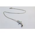 A LOVELY STERLING SILVER NECKLACE WITH STAR SHAPED PENDANT SET WITH FIRE OPAL LOOK INSET !! SWEET !!