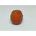 A STUNING VINTAGE STERLING SILVER RING SET WITH GENUINE CARNELIAN STONE