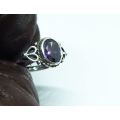 WOW !! A DELIGHTFUL SOLID STERLING SILVER RING SET WITH A FACETED PURPLE STONE !! SUCH A BEAUTY !!