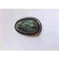 A CLASSY VINTAGE STERLING SILVER BROOCH SET WITH A GREEN CABOCHON NATURAL GEMSTONE MADE IN ISRAEL !!