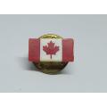 A vintage Canada souvenir badge / lapel pin