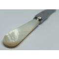 A small vintage table knife by John Turton & co with genuine mother of pearl handle