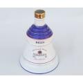 A vintage Bells whisky decanter commemorating the birth of Princess Eugenie 23 March 1990 by Wade
