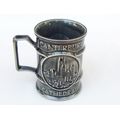 A detailed vintage souvenir mug from the Canterbury Cathedral made by Holkham Pottery of England