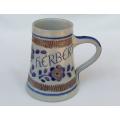 A vintage hand made hand painted display jug featuring the name Herbert by Goebel of Germany