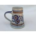 A vintage hand made hand painted display jug featuring the name Herbert by Goebel of Germany