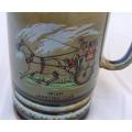 A heavy vintage Irish made jug with jaunting cart motif